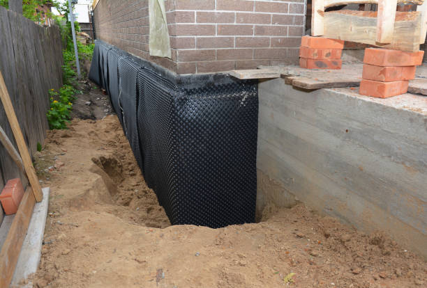 SJ Waterproofing Pros technician performing targeted Vapor Barrier Installation assessment in Dowagiac, MI